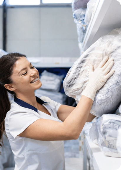 Staff smiling with clothes